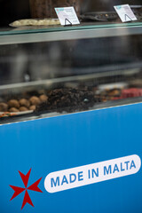 Valletta, Malta  A sign at a confectionary store says Made in Malta.