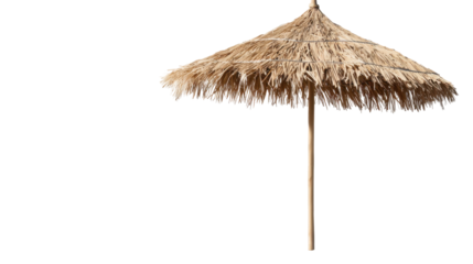 The straw umbrella stands tall, casting a shaded area on a sunny day, ideal for beachgoers looking to escape the heat. Enjoy time spent relaxing by the shore