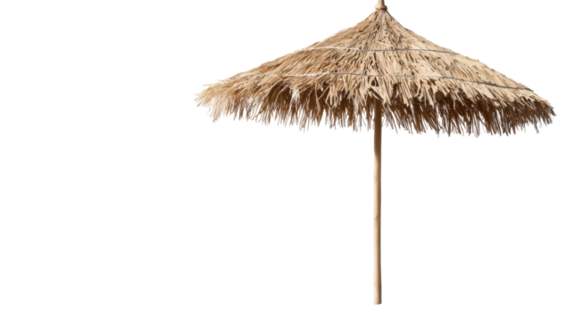 The straw umbrella stands tall, casting a shaded area on a sunny day, ideal for beachgoers looking to escape the heat. Enjoy time spent relaxing by the shore