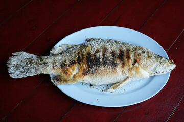 Another seafood that Thai people like to eat is salt-grilled sea bass.