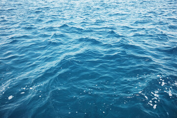 Emerald green waters and turquoise surface of blue sea wave and water background. Travel destination summer of ocean