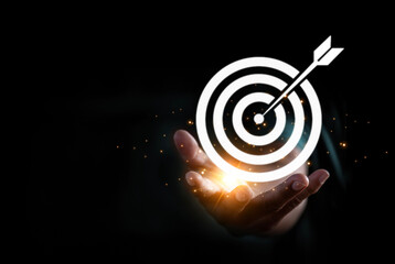 Businessman holding target icon business growth and vision, Target plans and business strategies...