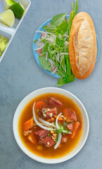 Bowl of tasty Bo Kho. Bowl of delicious Vietnamese stewed beef noodle - Bo Kho. Read with stewed beef. Vietnam food