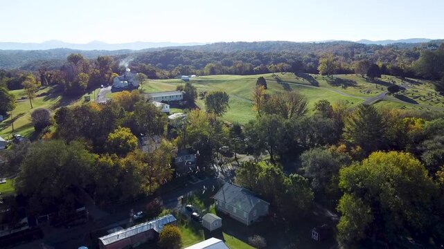 Aerial footage of the buildings and the green rolling hills in Fincastle, Botetourt, Virginia, USA