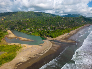 Aerial drone photo of the coastal town named Dominical at the pacific ocean in Costa Rica.
