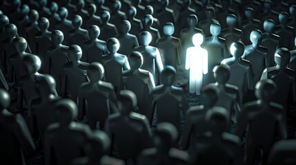Obraz premium A crowd of dark figures with one illuminated figure in the center, symbolizing individuality or uniqueness.