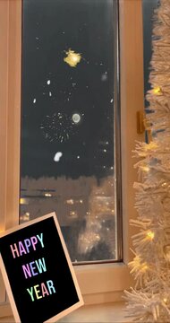 Potrait greeting card merry christmas and happy new year with firework in window