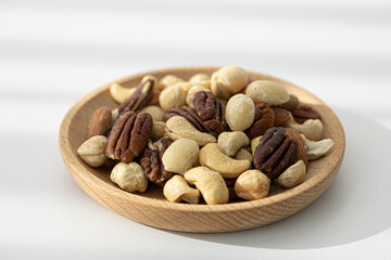 Pile of mixed nuts texture or background.