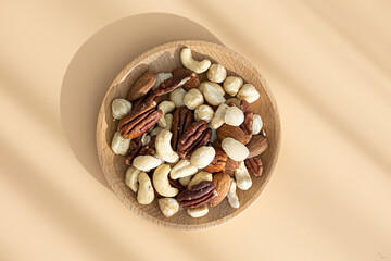 Pile of mixed nuts texture or background.