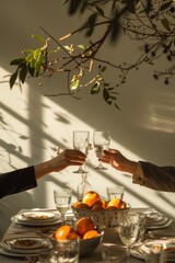 Fototapeta premium Hands raising glasses for a toast at a simple table, symbolizing an important moment