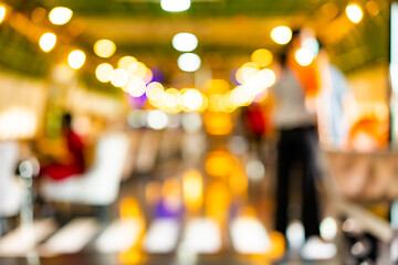 Images in the background that are blurry and resemble lights from other festivals or computer graphics.