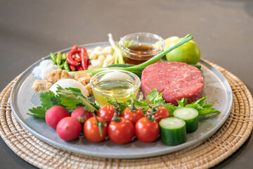 Spicy Thai Beef Salad will be cooked by ingredient such as red beef, onion, green vegetables, Red Radish, pepper, lemon ,and garlic.