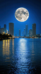 Obraz premium Moonlit scene of river reflecting city lights and large moon. tranquil atmosphere creates serene and captivating view of urban life at night