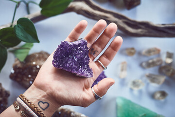 Hands, above and person with crystals, quartz and healing with belief, relax and spirit rock....