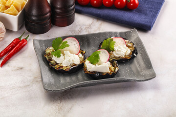Grilled eggplant with cheese and radish