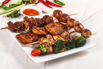 Asian grilled skewer assortment satay