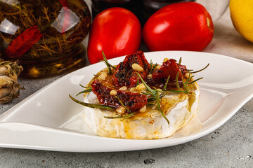 Baked camembert cheese with honey