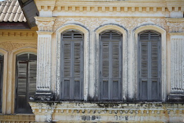 Detailed view of windows, doors and balconies of city buildings 