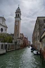 Naklejka premium Canals and clock towers of Venice Italy