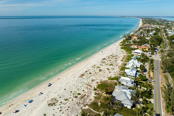 Large residential homes in island small town Boca Grande on Gasparilla Island in southwest Florida. American waterfront houses in rural US suburbs