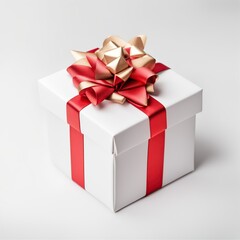 Obraz premium White gift box with red ribbon bow isolated on white background