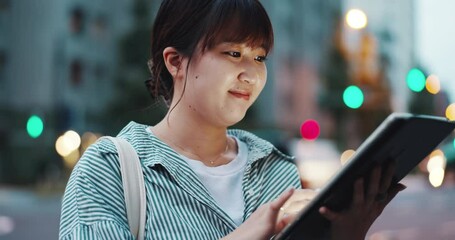 Woman, tablet and scroll at night in city with search for restaurant, landmark or adventure on street. Girl, person and happy with digital touchscreen for travel, location or booking taxi in Japan