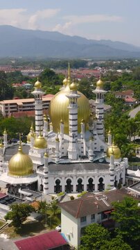 Aerial view of the Ubudiah Mosque in Kuala Kangsar. Vertical video