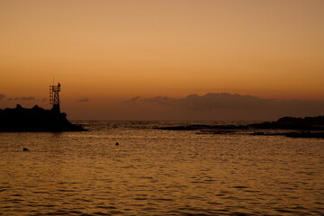 Obraz premium Dawn Silhouette at Muam Port