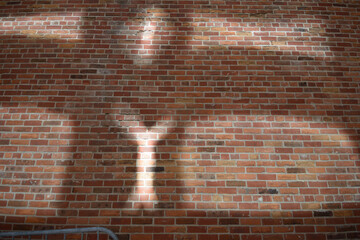 abstract reflection of light on a brick wall