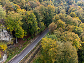 Obraz premium Aerial view on Mullerthal, Luxembourg's Little Switzerland, hiking routes, rock formations, moss-covered forests, tourist destination in Europe