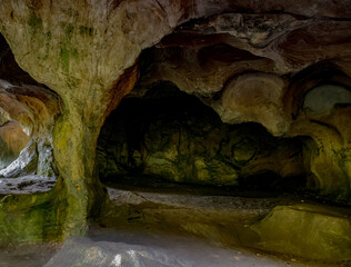 Scenic diversity of Mullerthal, Luxembourg's Little Switzerland, hiking routes, rock formations, moss-covered forests, tourist destination in Europe