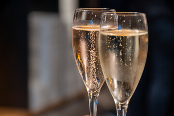 Tasting sparkling white wine, traditional champagne method making of cremant in caves on Moselle river valley in Luxembourg, wine tour and visiting caves