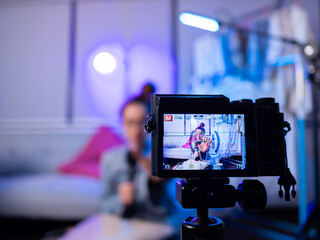 Live streaming session modern home video content indoor environment close-up view digital...