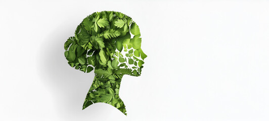 A human profile made of green leaves on a white background, an eco-friendly concept