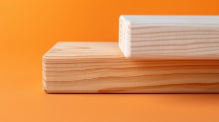 Wooden block on orange