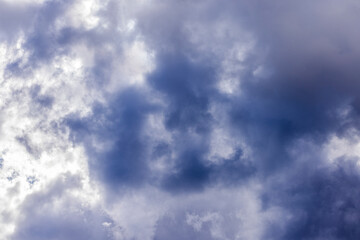 Dramatic sky with cumulus clouds creating a moody atmosphere