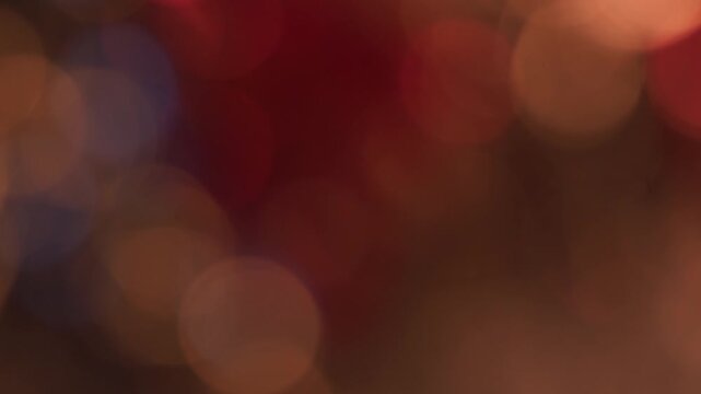 flan fixe court pour intro visuel, ou autre, billes de bokeh color&eacute;s, dans les tons orang&eacute; chaud, id&eacute;al pour introduction vid&eacute;o