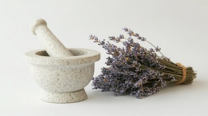 A rustic mortar and pestle paired with a fresh bundle of lavender, perfect for culinary or herbal uses.