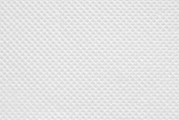 A sheet of clean tiled white tissue paper as background