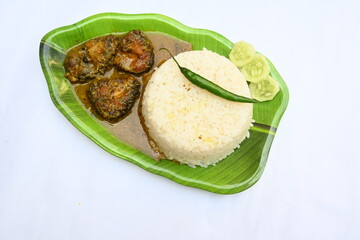Delicious Indian fish curry with rice. Traditional Asian fish curry dish. Asian food and meal. It is liked all over India. Indian style fish curry served in plate with rice. Indian food. 