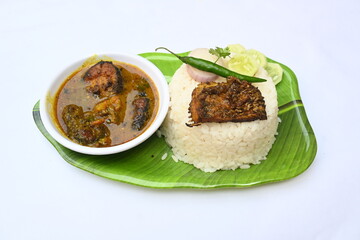 Delicious Indian fish curry with rice. Traditional Asian fish curry dish. Asian food and meal. It is liked all over India. Indian style fish curry served in plate with rice. Indian food. 