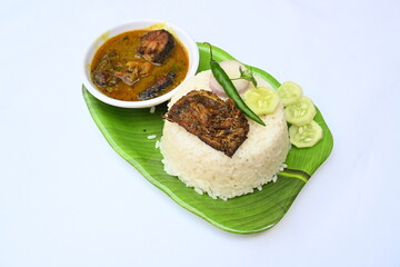 Delicious Indian fish curry with rice. Traditional Asian fish curry dish. Asian food and meal. It is liked all over India. Indian style fish curry served in plate with rice. Indian food. 