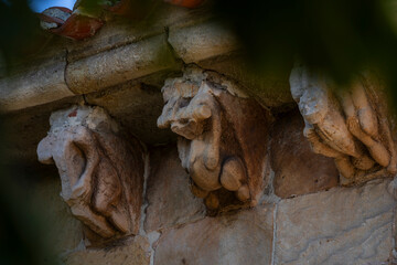 Romanesque carving, on Church of San Cipriano de Bolmir, Romanesque temple from the 12th century, Bolmir village, Campoo de Enmedio, Cantabria, Spain © Tolo