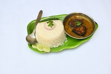 Delicious Indian fish curry with rice. Traditional Asian fish curry dish. Asian food and meal. It is liked all over India. Indian style fish curry served in plate with rice. Indian food. 
