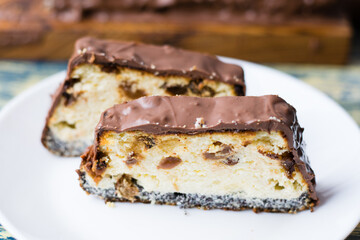 Delicious chocolate dessert, cheesecake with raisins and poppy seeds. Lviv cheesecake, a traditional Ukrainian dessert