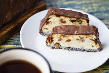 Delicious chocolate dessert, cheesecake with raisins and poppy seeds. Lviv cheesecake, a traditional Ukrainian dessert