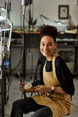 A joyful artisan skillfully creates stunning jewels in a vibrant workshop.