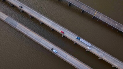 Traveling across America on interstate highway I-95 crossing Lake Marion, SC cars and trucks shipping and transportation