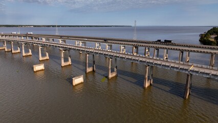 Traveling across America on interstate highway I-95 crossing Lake Marion, SC cars and trucks shipping and transportation