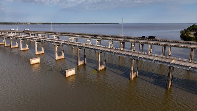 Traveling across America on interstate highway I-95 crossing Lake Marion, SC cars and trucks shipping and transportation